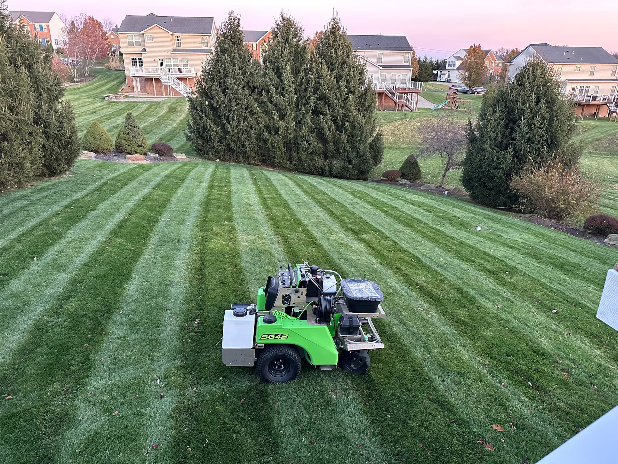 Weekly lawn maintenance with crisp striping and clean edging