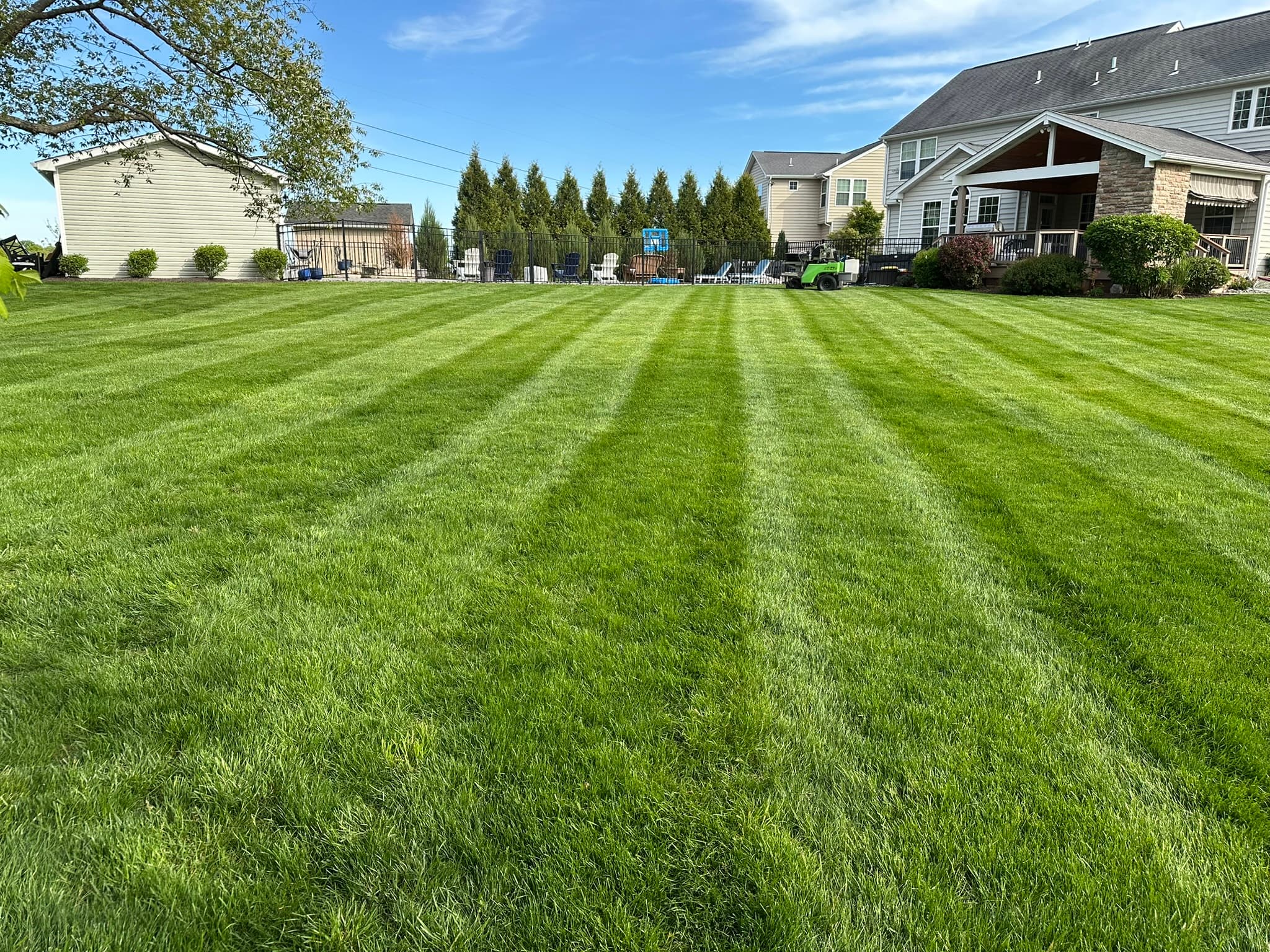 Landscape edge and lawn detail after seasonal mulching work