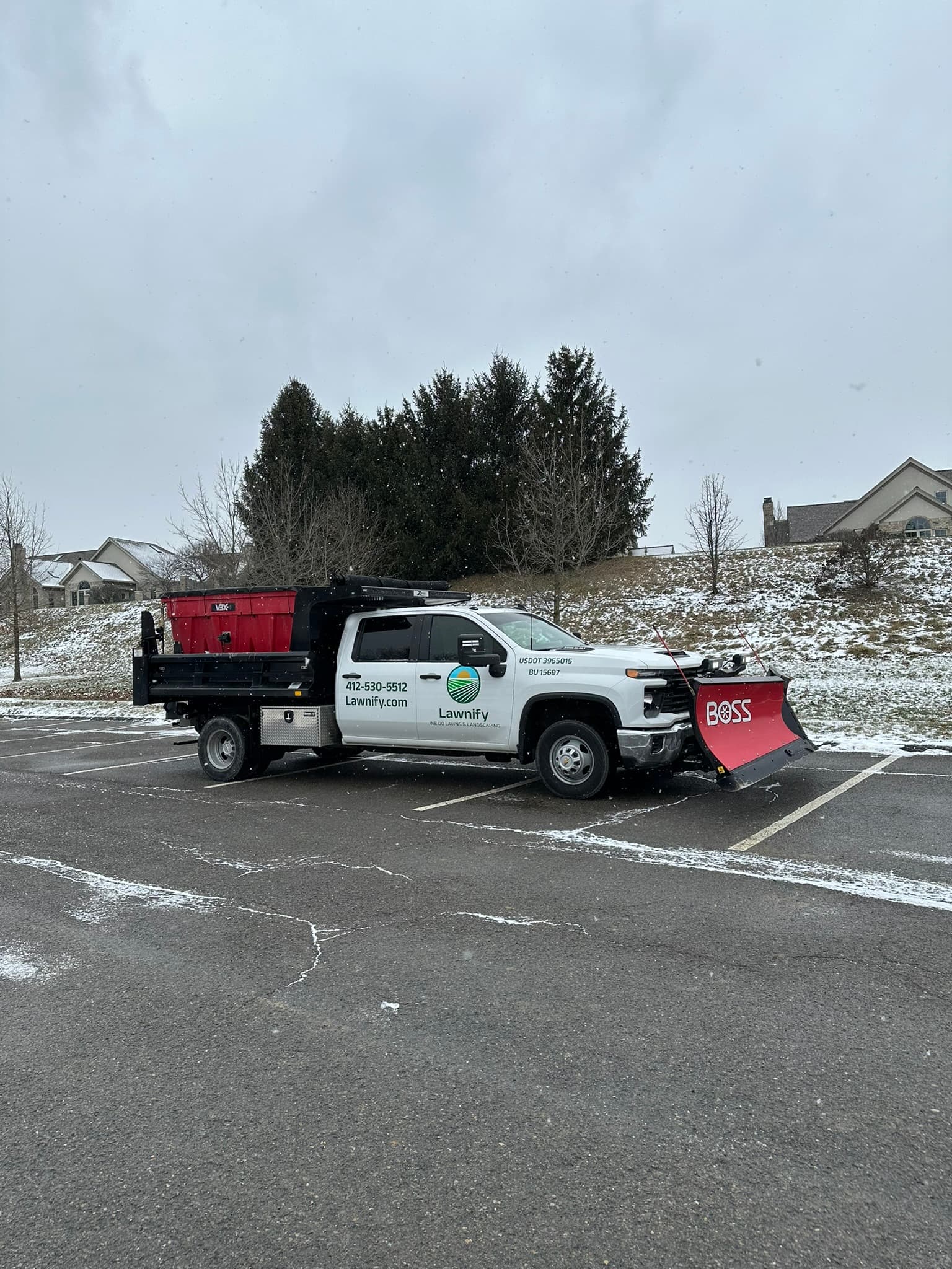 Snow removal equipment in use for winter service route